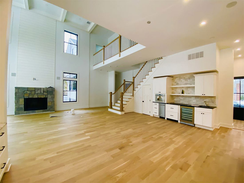 spacious home in staircase with wood tile panel