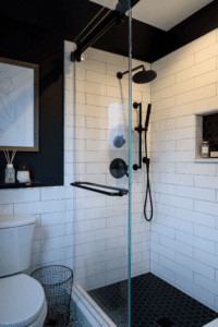 Glass-walled basement shower