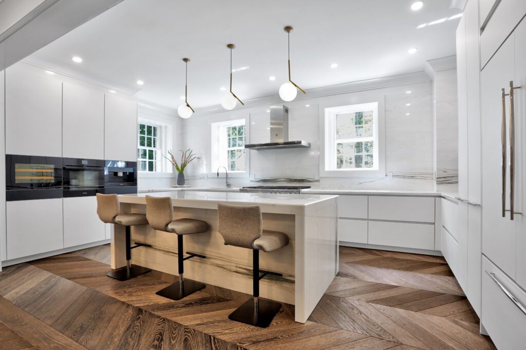 Princeton kitchen with brown floor, white paint, and black accents