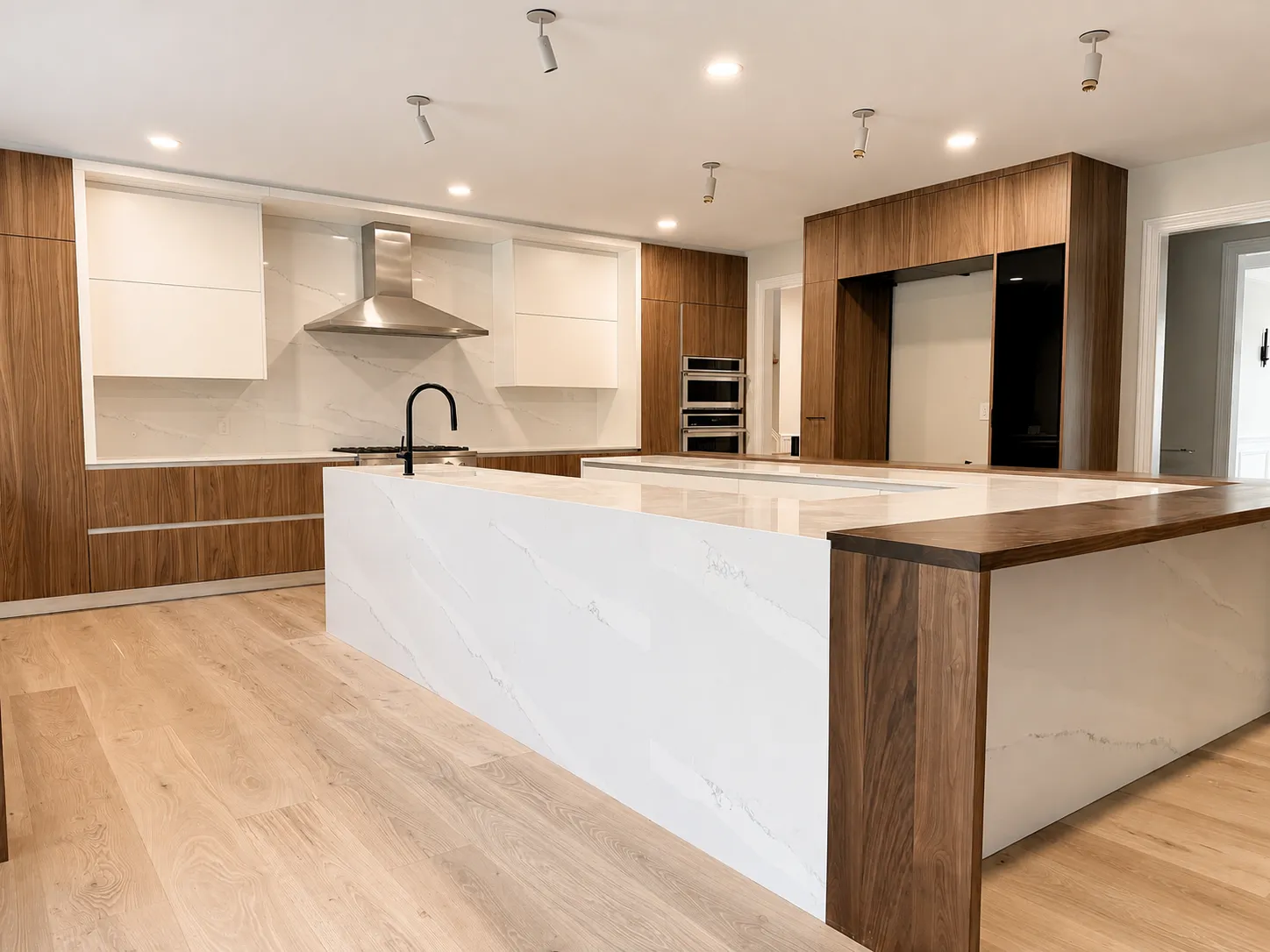 Edison modern kitchen large island and range view