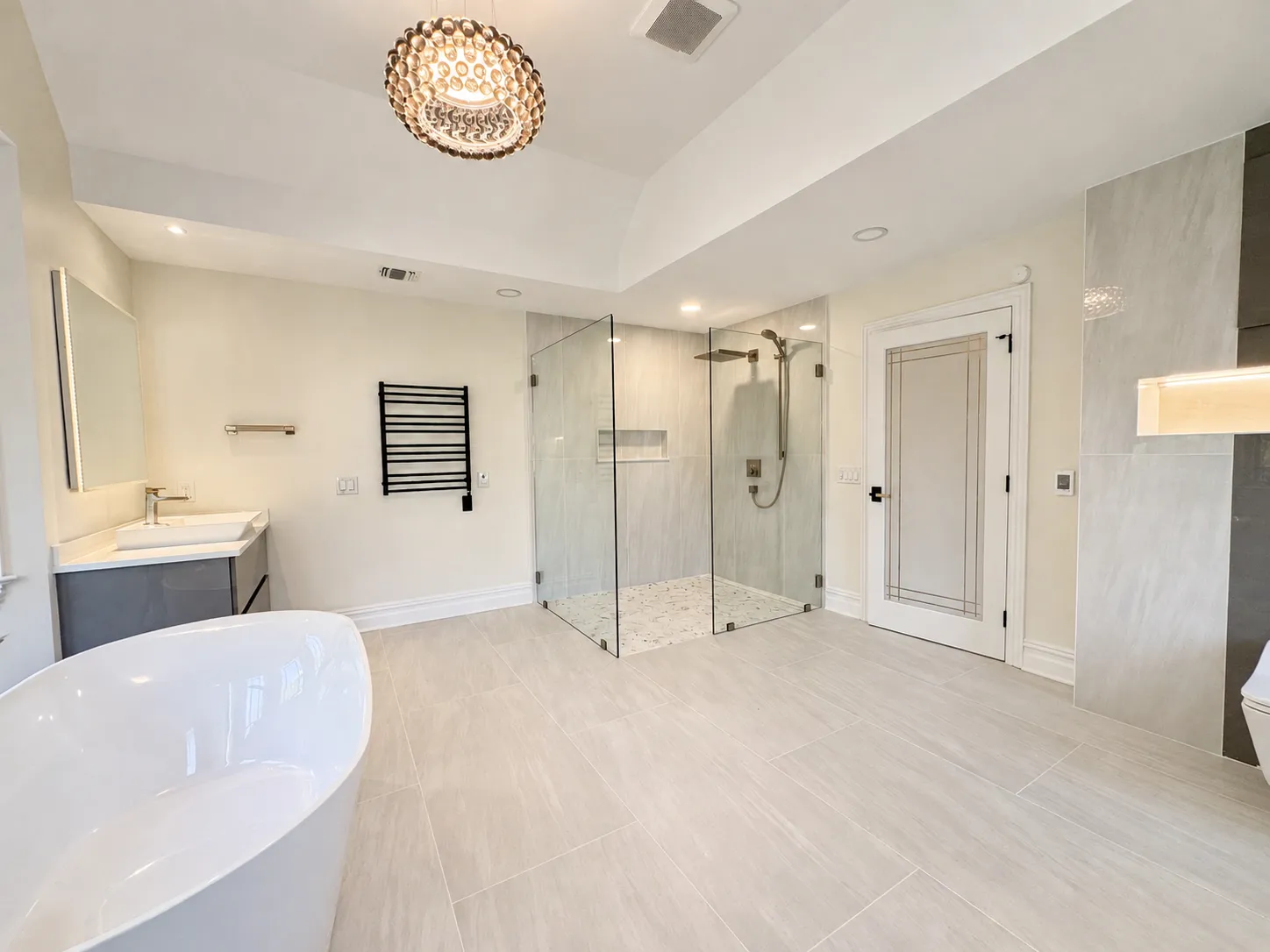 Edison master bathroom freestanding tub and glass shower, wide view