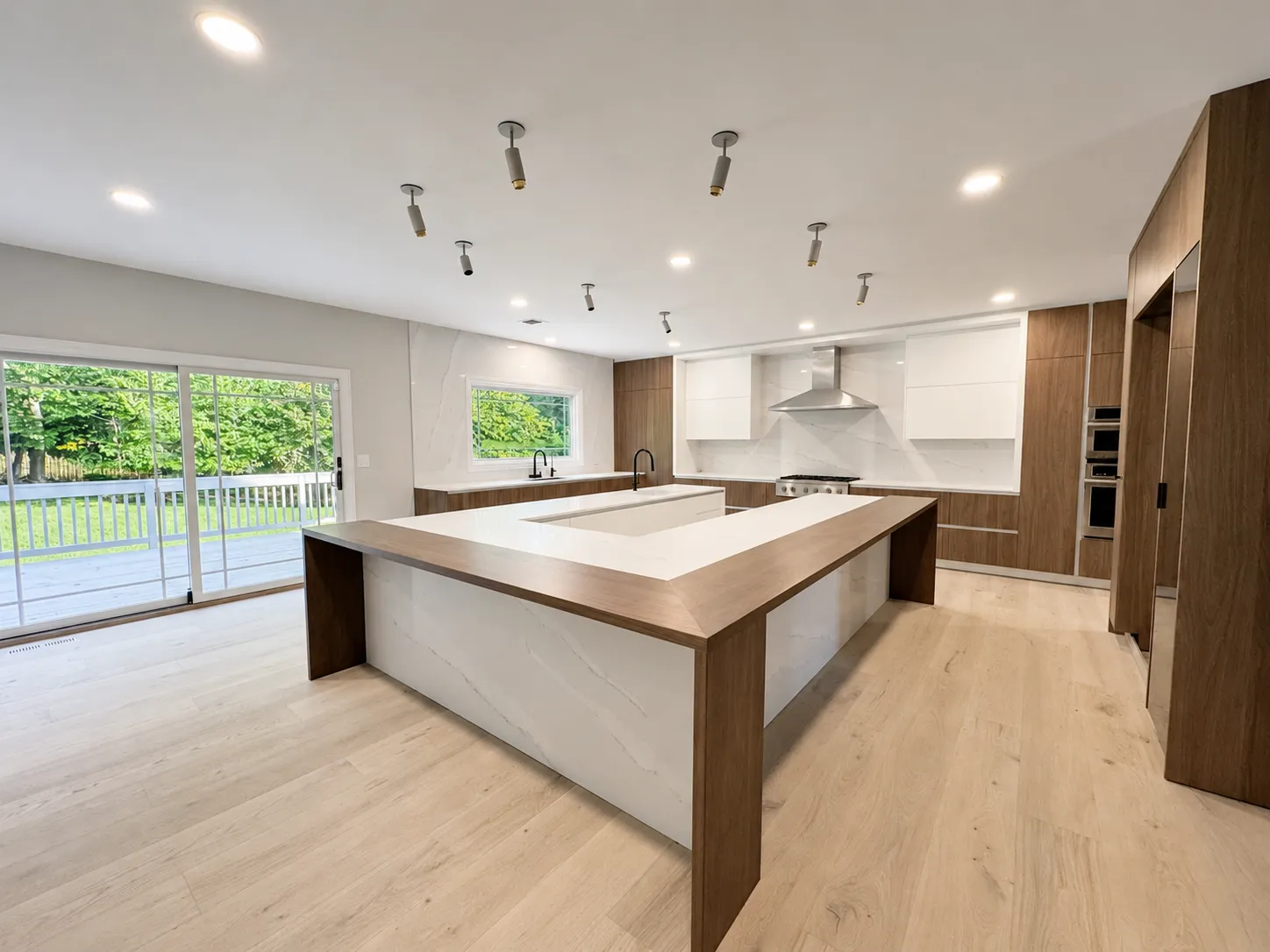 Edison modern kitchen island and deck view