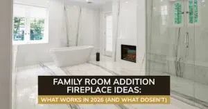 Luxury bathroom with soaking tub, glass shower, white fireplace, marble walls, and bright natural light.