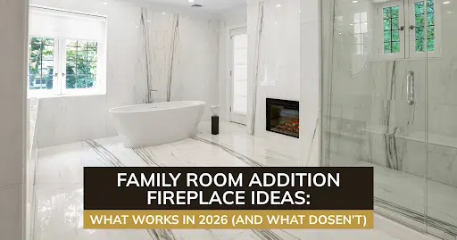 Luxury bathroom with soaking tub, glass shower, white fireplace, marble walls, and bright natural light.