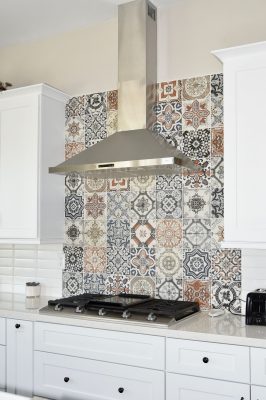 Quilt-style mosaic-tiled backsplash