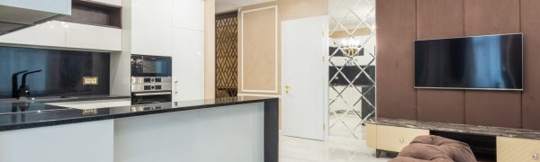 A brown color-schemed kitchen in a custom home